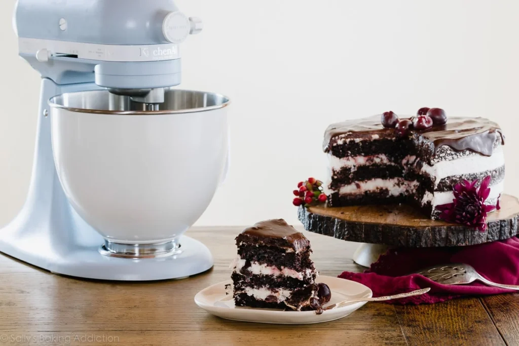 slice of black forest cake making image